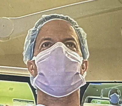 Dr. Fitzer performing laparoscopic bariatric surgery in the operating room